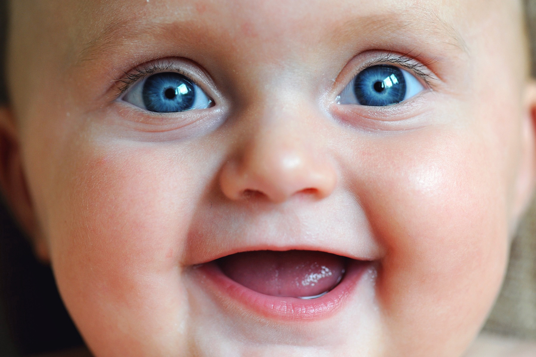 Close-up portrait of smiling baby