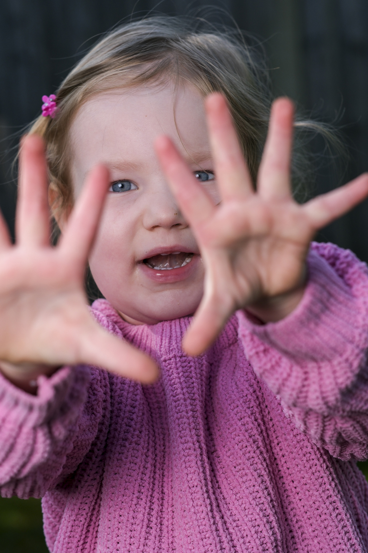 Lifestyle portrait of young girl in garden