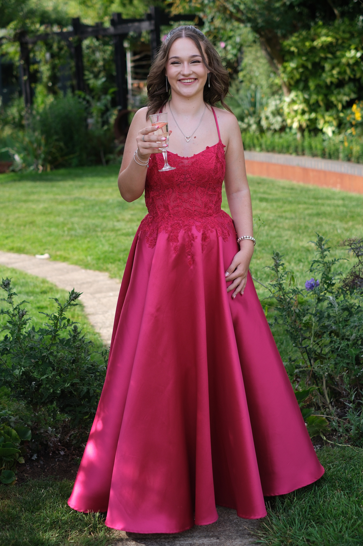 Portrait of teenage girl in prom dress