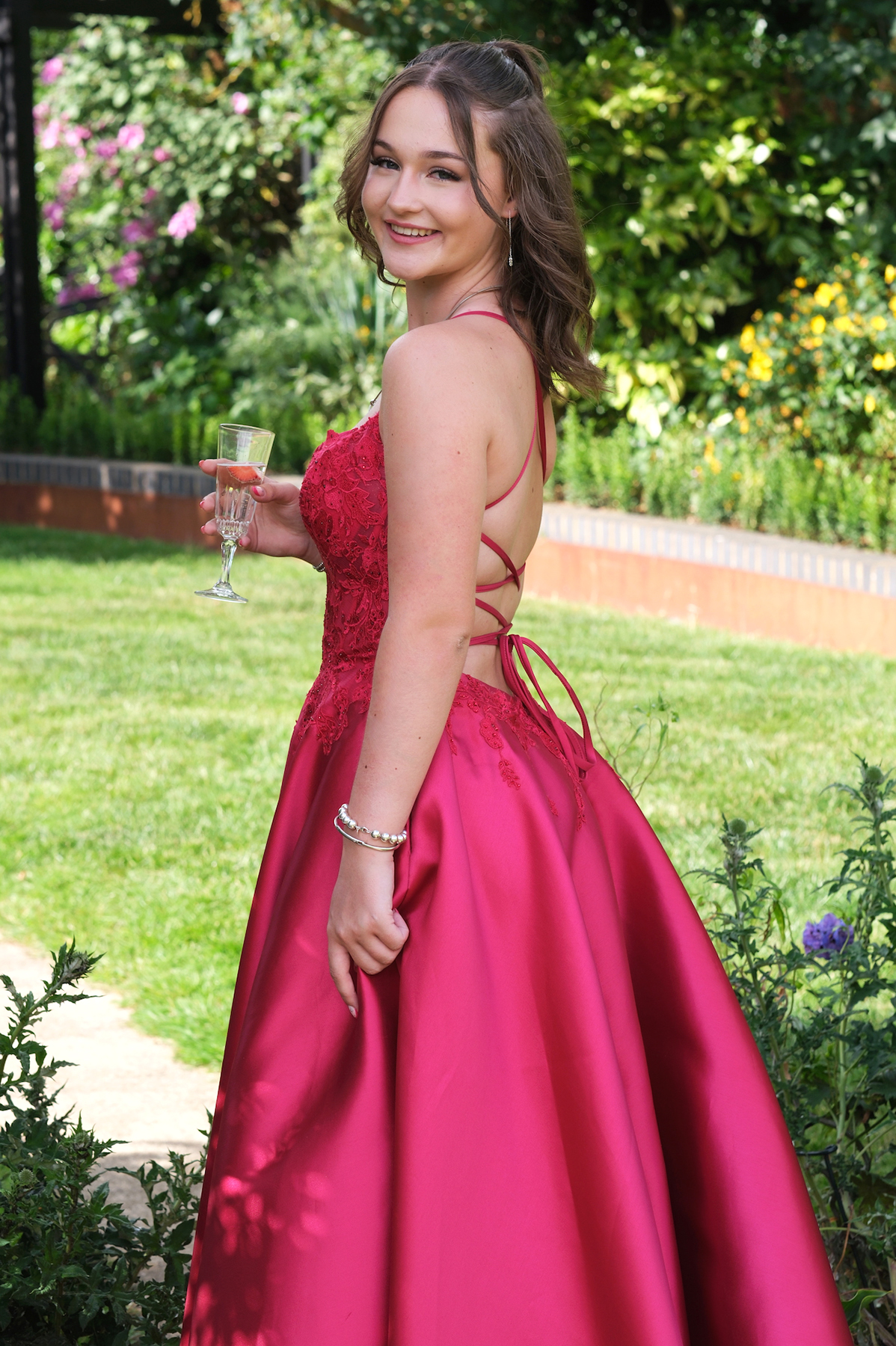 Portrait of teenage girl in prom dress