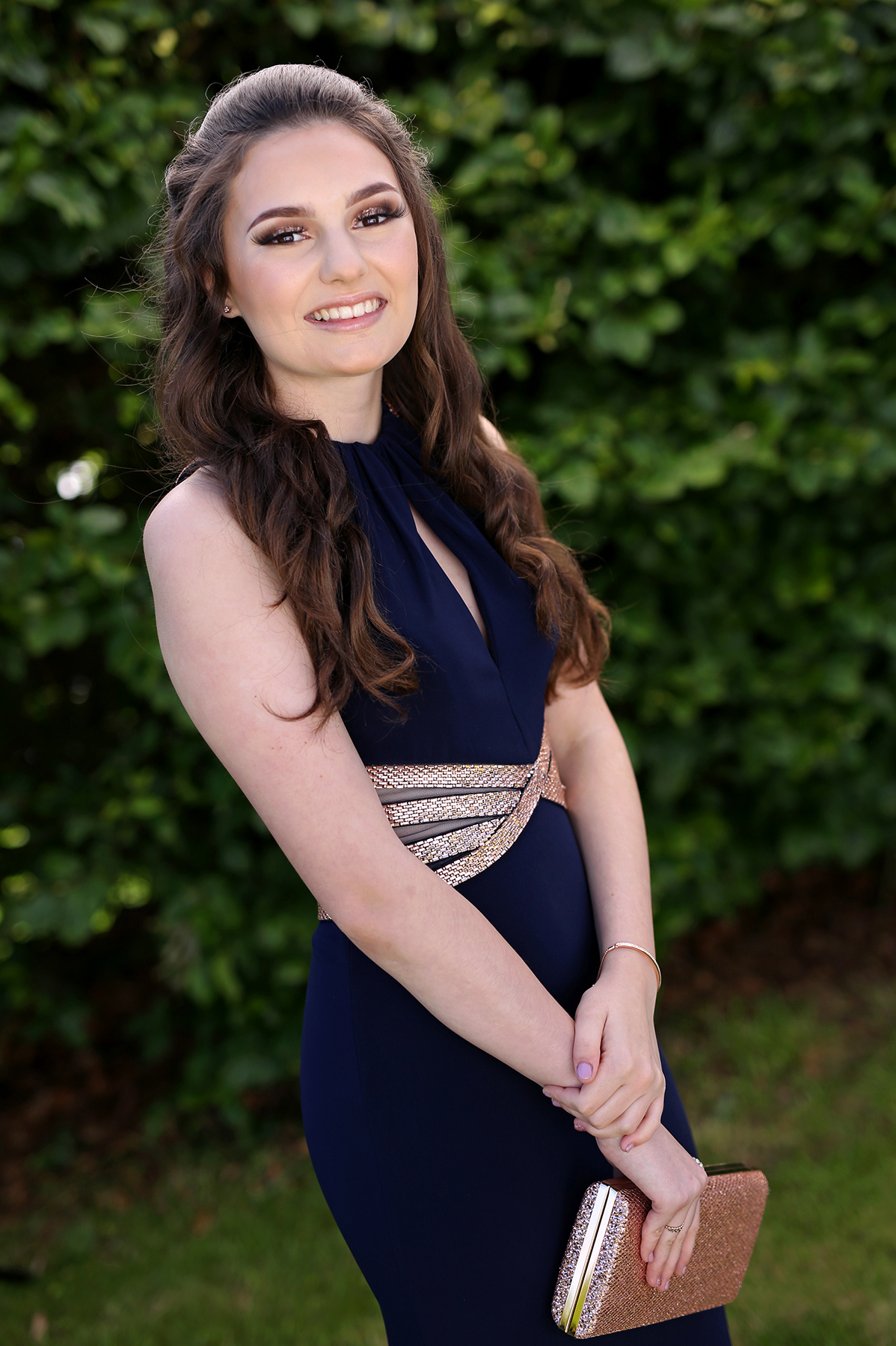 Portrait of teenage girl in garden on Prom Day