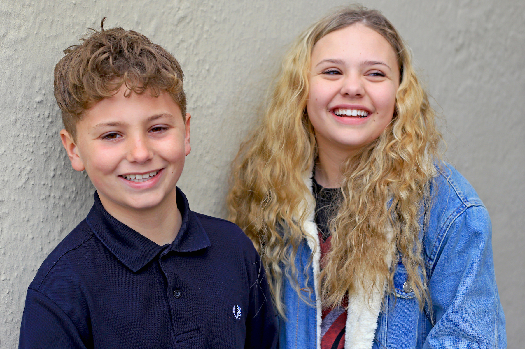 Lifestyle portraits of teenage siblings on location