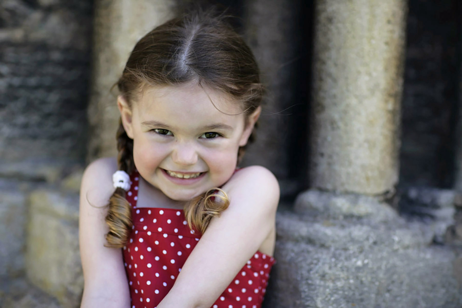 Location portrait of young girl smiling.