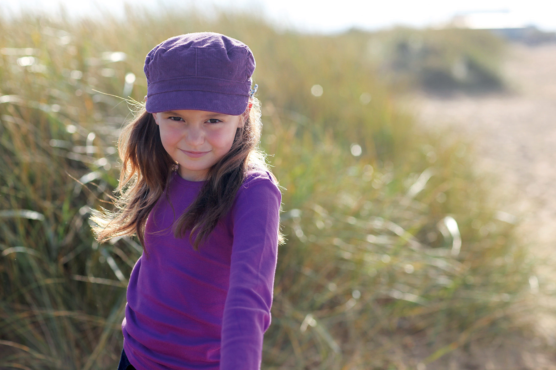 Location portrait of young girl on beach