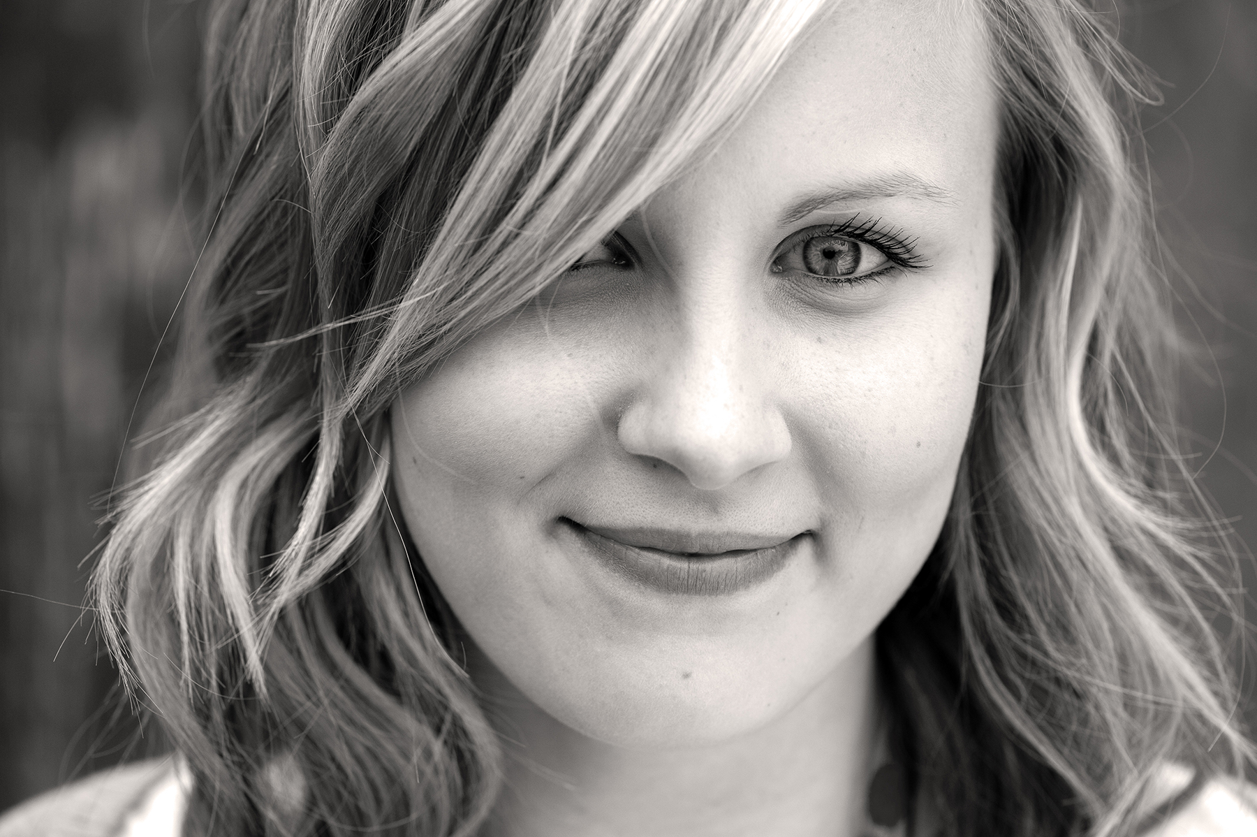 Lifestyle daylight portraits of teenagers on location - black & white with slight sepia tint